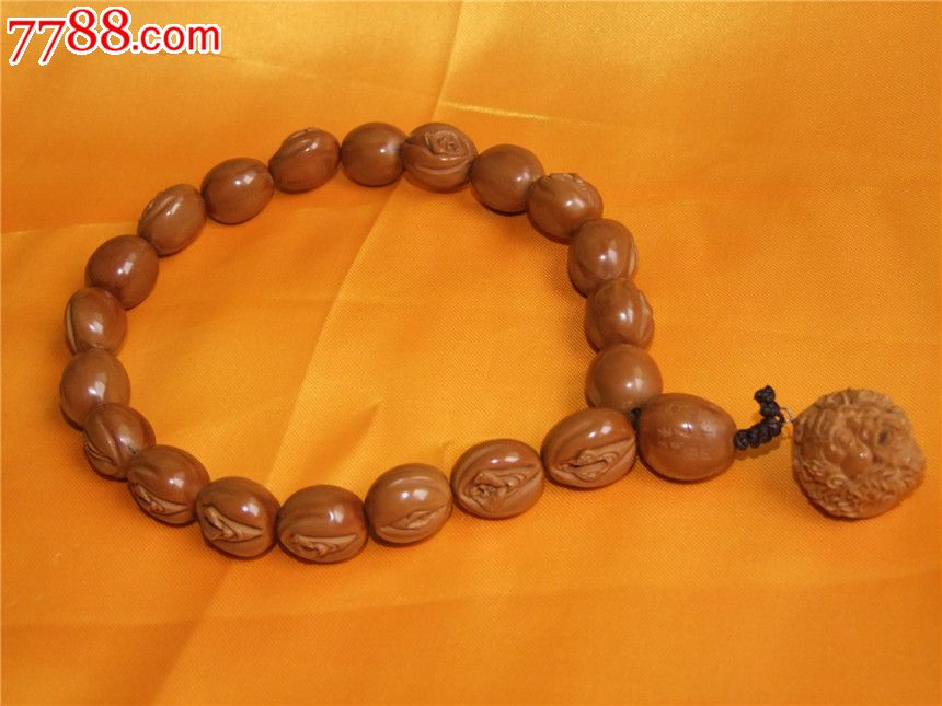 名家核雕:《云生的生命源》21颗铁核!_橄榄核