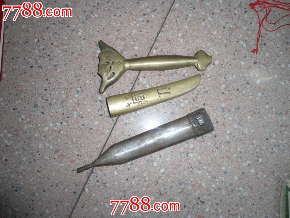 有懂木料的看下这把小刀的刀把是花梨木吗?