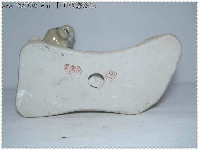 刘远长款的罗汉招财虎瓷塑